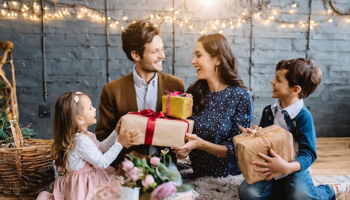 Family giving gifts they have received through Giftwhale